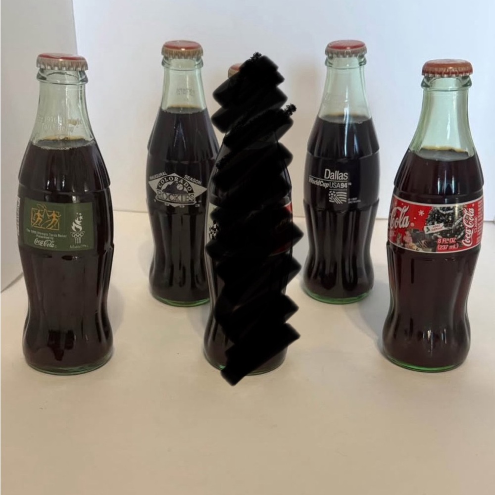 Coca-Cola various unopened bottles